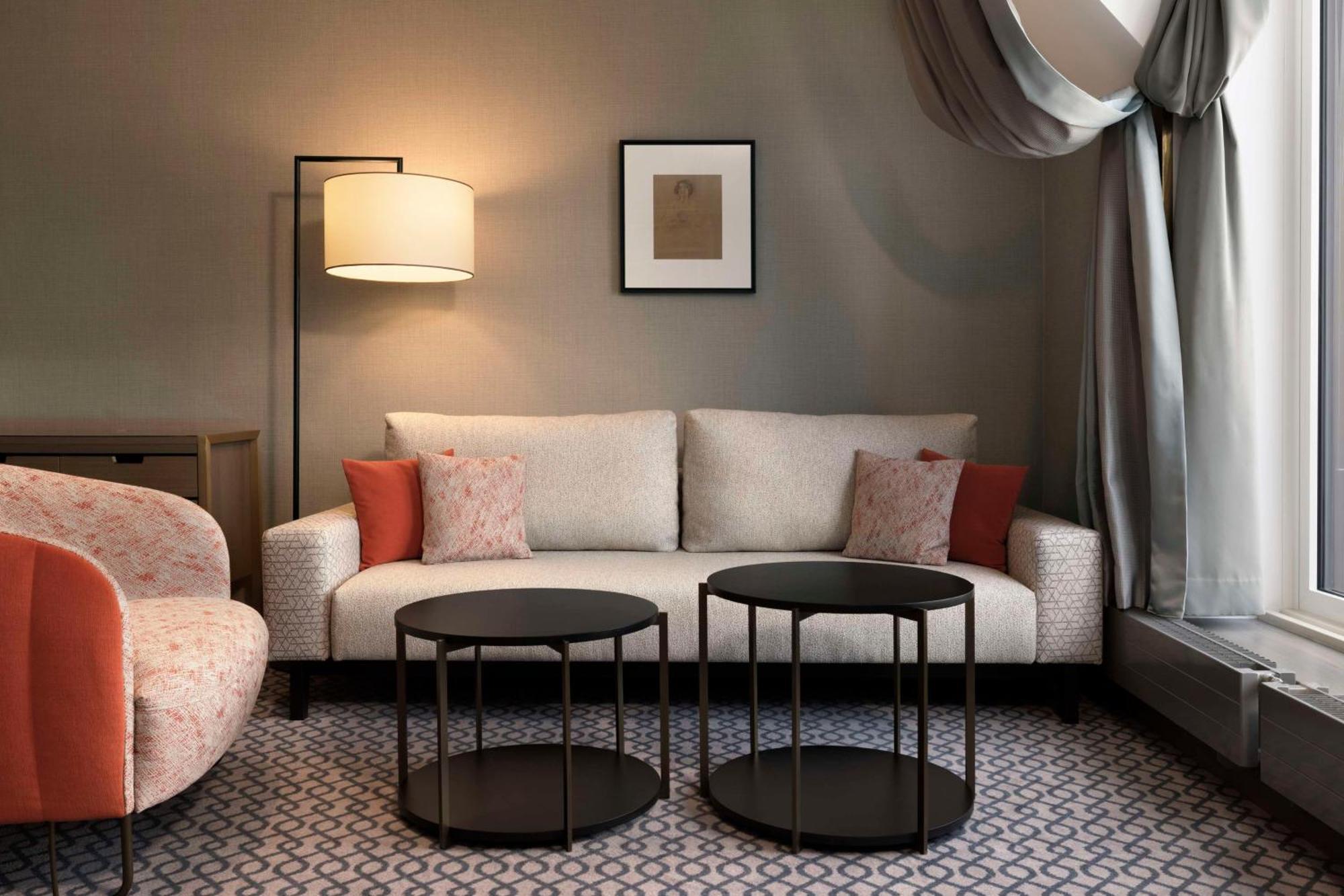 Hotel Hilton Vienna Plaza Esterno foto A living room